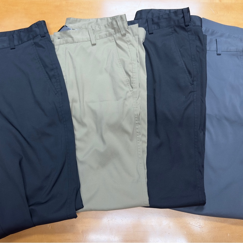 Four pair of Nike Golf pants